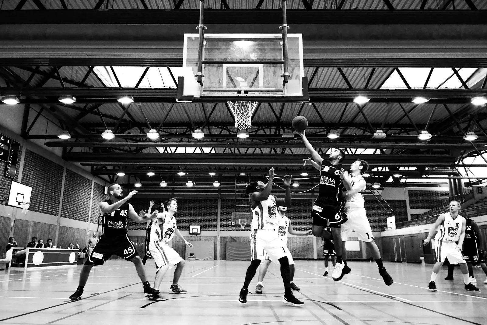 University recruitment vs. professional in basketball